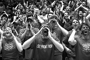 Zona Zoo fans cheer on the basketball team as it plays against California on Jan. 21. This year students can purchase Zona Zoo passes for $60, which includes admission to six football games.