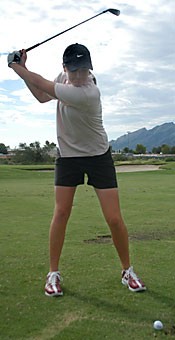 UA junior golfer Alison Walshe has her eye on the ball as she gets ready to swing during practice at Oro Valley Country Club. Walshe, who transferred from Tulane after Hurricane Katrina won the first golf tournament of the season on Sunday in the Mason Rudolph Championship in Nashville, Tenn. 