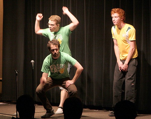 Valentina Martinelli/Arizona Daily Wildcat 

Comedy Corner members from left Name, Name and Name make up rap lyrics and dance in an improv-off  against ASU during the first night of the two night S.I.C.K. Comedy Festival in the Gallagher  Theatre on April 30, 2010.