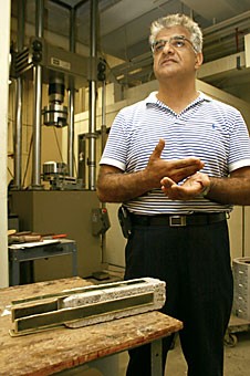 Civil engineering professor Dr. Hamid Saadatmanesh explains in his lab his invention of a fabric that can be used to repair damaged bridges quickly and efficiently.