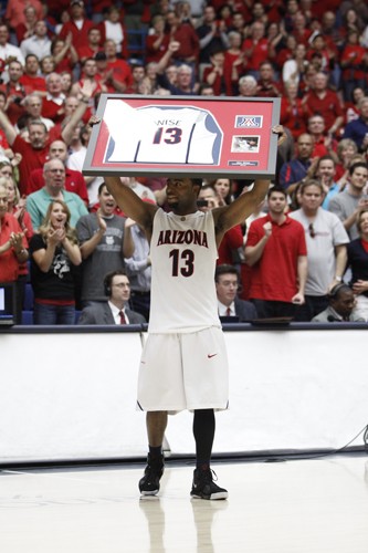 Mike Christy / Arizona Daily Wildcat

Nic Wise iced the game in double-overtime with a layup with just over one second left to beat the USC Trojans 86-84 Saturday in McKale Center. It was Senior Day for the Cats as Nic Wise played his last game in McKale.
