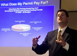 Patrick Kass, director of Parking and Transportation Services,  delivers a presentation on the budget in the Catalina Room of the Student Union Memorial Center last Tuesday. The departments Park and Ride program is costing the department more money than PTS revenue being brought in from parking permits alone.