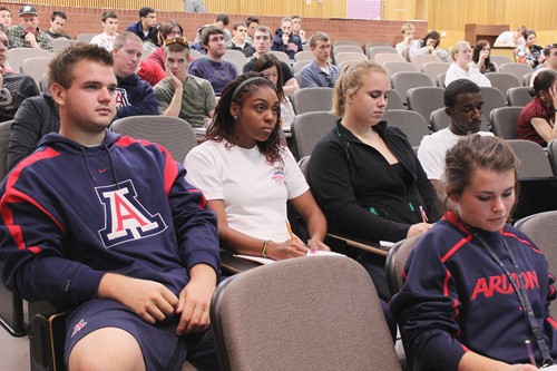 Lisa Beth Earle / Arizona Daily Wildcat

Tomaz Bogovic, left, an undeclared sophomore, Ariel Coleman, a psychology sophomore, Taylor Freeman, a business sophomore, Armand Rhone, a pre-business sophomore, and Jordan Ronstadt, front, a physiology junior, pay close attention to a guest speaker during Rock and American Popular Music (MUS 109) on Monday, Nov. 23. The class mates are also teammates on the UA track and field team.