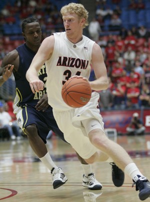 UA forward Chase Budinger drives to the basket in a 74-57 win over NAU on Sunday in McKale Center. UA interim head coach Russ Pennell gave his team a State of the Team Address Monday to discuss the Wildcats first five games.