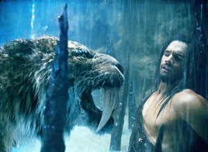 D Leh played by Steven Strait isnt too thrilled about feeding this hungry cat in 10,000 B.C. 