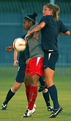 Senior London King, left, fights for a loose ball in Sunday nights intrasquad scrimmage at Murphey Stadium. The Wildcats host Cal Poly next Sunday at 7 p.m.