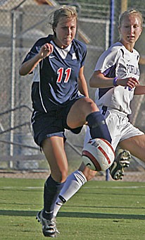 unior defender Kaity Heath, left, stops the ball with her left foot in a Sept. 22 2-0 loss to Portland. Heath joined junior defender Claire Bodiya on a national championship club team, the Sereno Golden Eagles, back in 2003, prior to coming to Arizona.