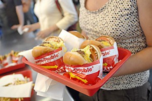 Hundreds of people waited hours in line yesterday to be one of the first to have an In-N-Out burger made in Tucson. 