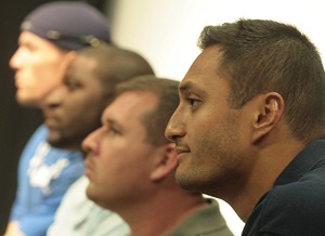 Retired armed forces members, from left, Jeff Odom, a rehabilitation counseling junior; Ranhn Johnson, a speech and hearing sciences junior; Dan Standage, a rehabilitation senior; and Gerard Ah-fook, a pre-business freshman, speak to a crowd in the Gallagher Theater about the problems facing disabled veterans in their pursuit of a college education. 