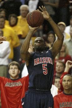 Former UA guard Jawann McClellan shoots from the corner during a 64-59 overtime loss to ASU in Tempe on Jan. 9, 2008. McClellan hope to coach at the Division I level.