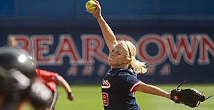 UA pitcher Taryne Mowatt uncorks a pitch yesterday in Arizonas 8-1 win over Texas Tech to help the Wildcats finish the Worth Wildcat Tournament a perfect 5-0. Mowatt allowed just a hit and a run in the contest after pitching the third no-hitter of her career Friday against the Red Raiders.