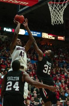 Arizona forward Jordan Hill jumps up for a short shot in a 69-56 win over San Diego State on Dec. 10 in McKale Center. The Wildcats face No. 4 Gonzaga today in U.S. Airways Center.
