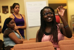 From left, Devon Jernigan, a sophomore interdisciplinary studies major, and Genna Sethi, a freshman biology and psychology major, listen as Melissa Kiguwa, a freshman political science major, discusses issues of race in the criminal justice system during a discussion workshop on oppression in the Student Union Memorial Center Tuesday night.