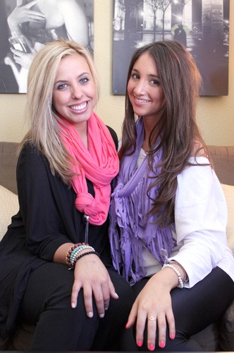 Lisa Beth Earle/ Arizona Daily Wildcat

Dana Constantino, left, a family studies and human development junior, and Alyssa Wasko, a retailing and consumer sciences junior, rock their Donni Charm scarves in their Campus Crossings University Heights apartment on Friday, April 2. Constantino and Wasko are the founders and designers of the up-and-coming Donni Charm fashion line.
