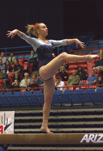Rodney Haas / Arizona Daily Wildcat

Arizona gymnastics freshman Molly Quirk works the balance beam during the Gymcats