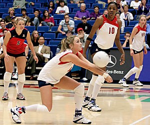 Junior libero Katie Jackels sets the ball in Arizonas loss to then-No. 6 Washington Oct. 20 in McKale Center. The Wildcats failed to reach the NCAA Tournament this season after doing so the past 10 years.