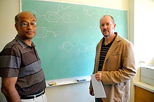 Optical sciences and physics professor Sumit Mazumdar, left, and associate professor of physics Charles Stafford have come up with a way to turn molecules into tiny transistors. 