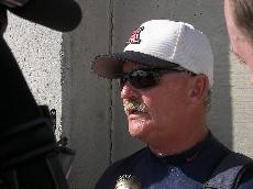 UA interim head coach Larry Ray talks to the media at ASA Hall of Fame Stadium after the Wildcats 5-1 loss to Alabama on Saturday. Ray led Arizona to its 20th Womens College Wolrd Series berth.