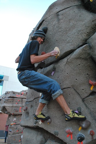 Valentina Martinelli/ Arizona Daily Wildcat

Stephen Mangum, a sophomore majoring in philosophy, climbs the rock wall at the rec centers bouldering competition during Rec Fest. The event featured a volleyball competition, an indoor soccer competition, free food, massages, haircuts and manicures to promote the buildings new expansion on Feb 23, 2010. 
