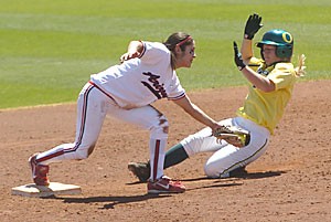 UA second baseman Chelsie Mesa tags out Oregon first baseman Kristi Leiter as she slides into second. The Wildcats and Mesa, whos second on the team with 31 RBIs, travel to the Bay Area to start the second half of Pac-10 play this weekend.