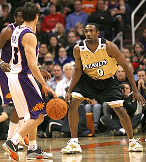 Former Wildcat and current Wizard guard Gilbert Arenas defends two-time NBA MVP Steve Nash in Washingtons 144-139 overtime victory Dec. 22 at Phoenix. Although Arenas has not earned MVP credentials yet, as a two-time All-Star and one of the better players in the league he is quickly putting himself in the conversation of best ever former Wildcat in the NBA.