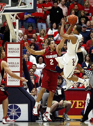 Arizona guard Jerryd Bayless takes a shot over Cardinal guard Landry Fields in the Wildcats 67-66 loss to then-No. 7 Stanford on Saturday in McKale Center. With UA guard Nic Wise out to injury, Bayless has carried the offensive load for the Wildcats.