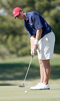 No. 33 Brian Prouty putts the ball in Arizonas third-place finish at the National Invitational Tournament at the Omni Tucson National Golf Club yesterday. Prouty, a senior, finished fourth individually at the event, shooting 2-under 70 and a 6-under 210 overall.