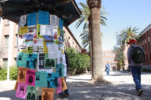 Hallie Bolonkin / Arizona Daily Wildcat

The bulletin board on North Campus Drive is covered with ASUA campaign flyers.