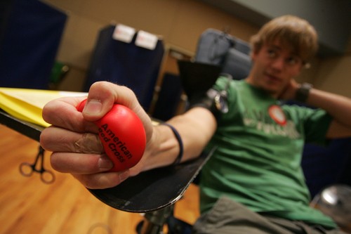 Mike Christy / Arizona Daily Wildcat

Psychology freshman Andrew Devore squeezes a stress ball before donating blood Monday in the SUMC. Devore says he donates as often as he is medically allowed.

Students donated at the American Red Cross blood drive Monday in the north ballroom of the SUMC.