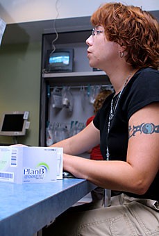 Rebecca Moreno, chief pharmacist at Campus Health Service, prepares for the switch of Plan B from prescription availability to over-the-counter sales. The FDA approved the new rules for the morning-after pill yesterday. 