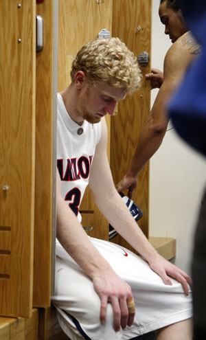 Sophomore forward Chase Budinger sits at his locker following Sundays 59-54 loss to ASU in McKale Center. Budinger only shot 1-for-12 in the game.