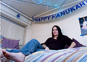 Judaic studies sophomore Phyllis Kenigsberg shows her holiday spirit with blue lights and decorations for Hanukkah. 