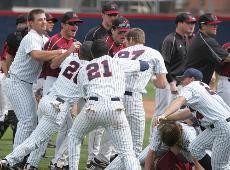 Members of the Arizona and UMass baseball teams engage in a mid-game scuffle during a 9-0 Wildcat win Sunday afternoon at Sancet Stadium. Arizona won two games of a three-game series against the Minutemen.
