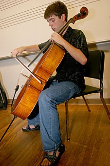 Cellist Michael Ronstadt practices for his duet with Aryo Wicaksono tomorrow and Saturday at Crowder Hall. Ronstadt also plays the guitar and the charango, a South American lute-like instrument made from the shell of an armadillo. 
