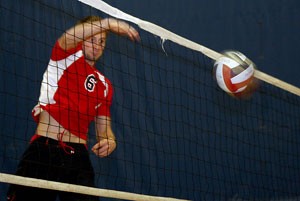 Graphic design sophomore Ryan Barry spikes the ball in the Arizona club volleyball teams practice March 12. Though Arizona doesnt have a Division I mens volleyball team, its club team is considered to harbor some superior male volleyball talent.