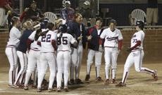 UA senior Sam Banister prepares to touch home plate after hitting one of her two three-run home runs during a 10-8 Arizona win against ASU on Friday at Hillenbrand Stadium. Banister, along with much of the rest of the team, has been fighting through injuries for most of the season.