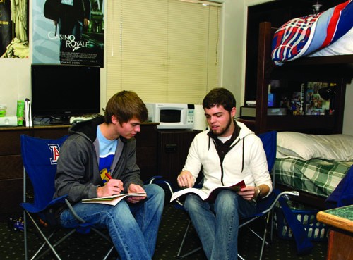 Dirk Dodge, left, and Zachary McKeever, right, residents of Gila Residence Hall, study together in their room. Many students say that strong communication with their roommates makes the dorm experience a positive one.