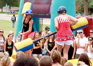 Students participate in the gladiator joust event during War of the Roses on Sept. 12, 2006. Starting today through Friday, sororities will compete in events organized by Pi Kappa Phi fraternity to raise funds for the fraternitys national outreach program, Push America, which will set up summer camps for disabled children.