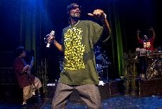 Snoop Dogg dances to one of his classic songs to a packed Rialto Theatre on Sunday night.