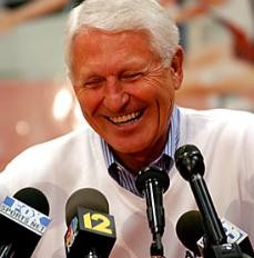 UA head coach Lute Olson laughs as he fields questions at a 2003 press conference.