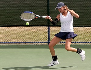 Junior Danielle Steinberg swats the ball during her win over ASUs Nadia Abdala at the Robson Tennis Center on Saturday. Steinberg and seven other Wildcats - six men and one woman - will be in action at the Pac-10 Championships starting today on Ojai, Calif.