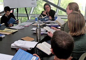 Alison Deming, a creative writing professor and non-fiction writer, gives a class about non-fiction writing to a group of MFA graduate students at the Poetry Center last Thursday. The center won an annual award for its contribution to literature in Arizona.