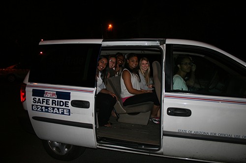 Annie Marum  / Arizona Daily Wildcat

Safe Ride passengers ride with sophomore driver Michael Bowman on Monday, April 11. ASUAs Safe Ride broke a record Thursday night for the most passengers in one night. We had a total of 1,019 people, there was a lot going on to say the least, said Bowman.

Safe Ride passengers Rebekah Jackson, Julie Morse, Jasmine Larkins, Raashi Parihar, Kiah Egebreston and Desiree Bock get a ride from Manzanita-Mohave Residence Hall by Safe Ride driver Michael Bowman  Monday, April 11. 