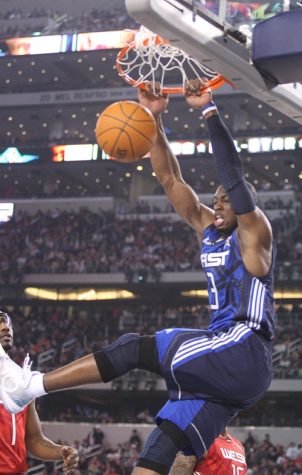 The East's Dwyane Wade dunks the ball during the NBA All-Star game at Cowboys Stadium in Arlington, Texas, Sunday, February 14, 2010. (Ron T. Ennis/Fort Worth Star-Telegram/MCT)