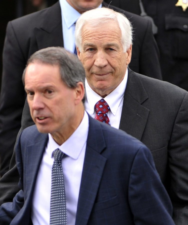 Jerry+Sandusky%2C+back%2C+and+his+attorney+Joe+Amendola%2C+front%2C+exit+the+Centre+County+Courthouse+after+a+hearing%2C+in+Bellefonte%2C+Pennsylvania%2C+Friday%2C+February+10%2C+2012.+%28Nabil+K.+Mark%2FCentre+Daily+Times%2FMCT%29