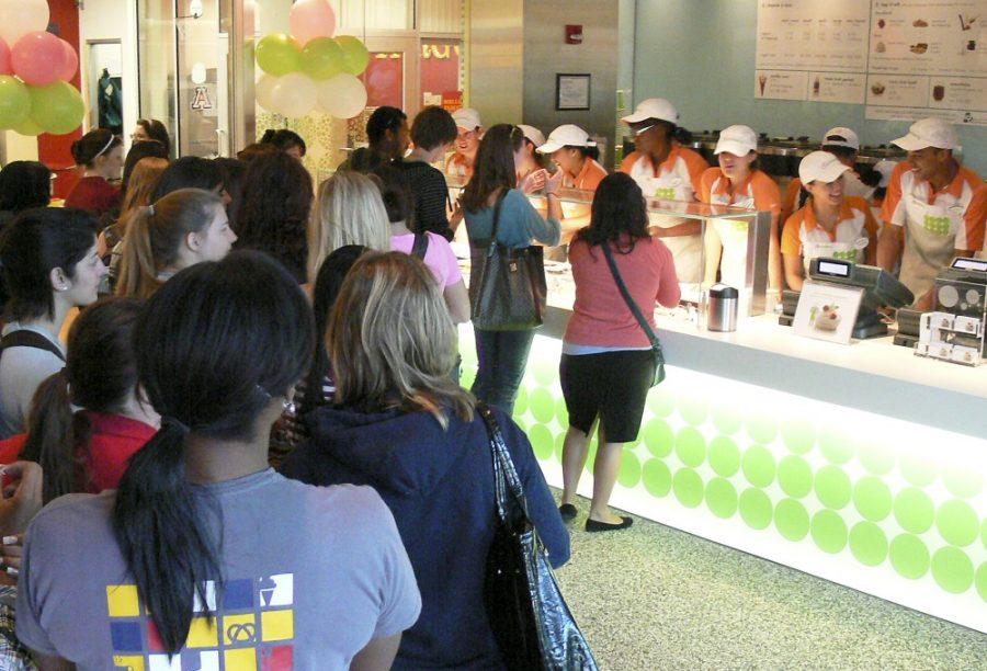 Jim ORourke / Arizona Daily Wildcat

UA students and customers stand in line at the grand opening of Pinkberry on Tuesday, located in the Student Union Memorial Center.