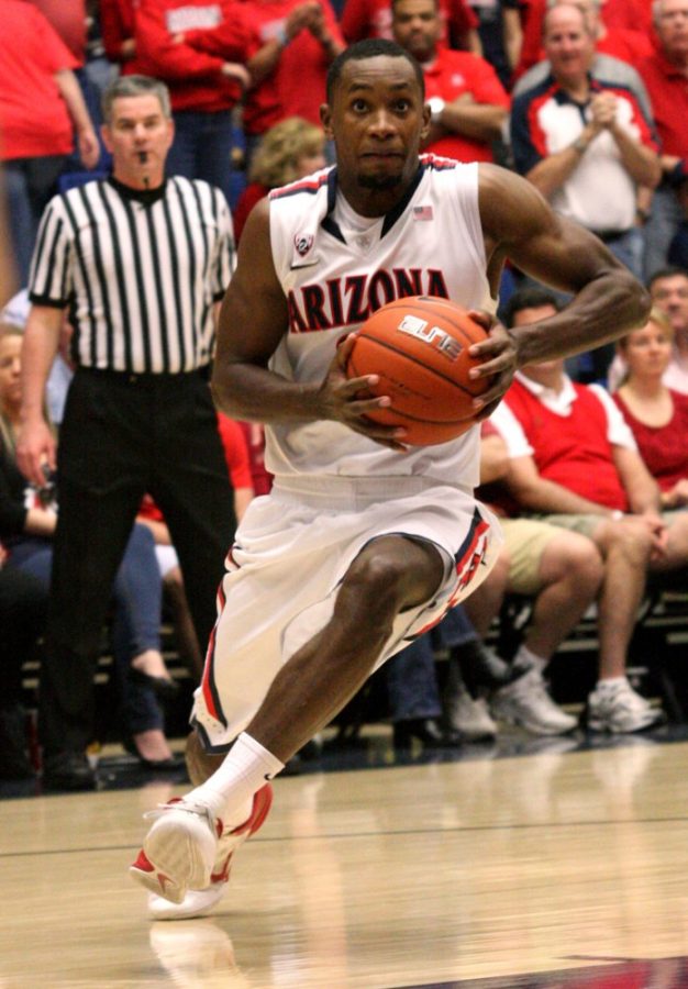 Colin Darland / Daily Wildcat

Arizona senior guard Kyle Fogg, 21, drives the lane during the second half of the Wildcats match-up against the Utah Utes in McKale Center on Saturday, February 11, 2012

