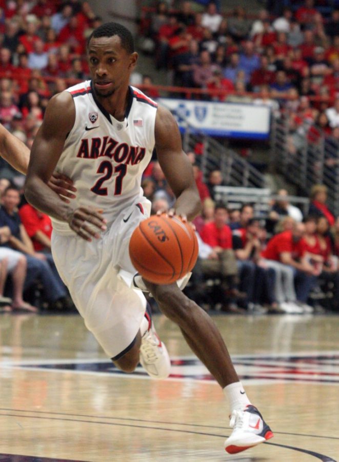 Arizona senior guard Kyle Fogg, 21, drives the lane during the second half of the Arizona Wildcats match-up against Souther Calif. in McKale Center on Thursday, February 22, 2012.

Colin Darland / Daily Wildcat

