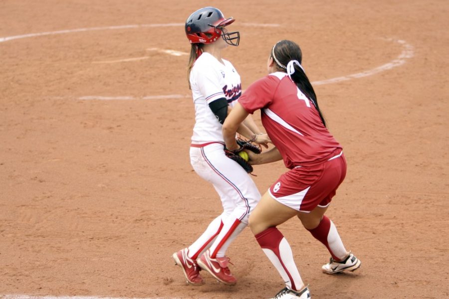 Lauren Chamberlain tags a Wildcat out for the win over Arizona on May 26 in game 2 of the NCAA Super Regional tournament. The win over Arizona earned the Sooners a spot in the Womens College World Series. Melodie Lettkeman/ The Daily