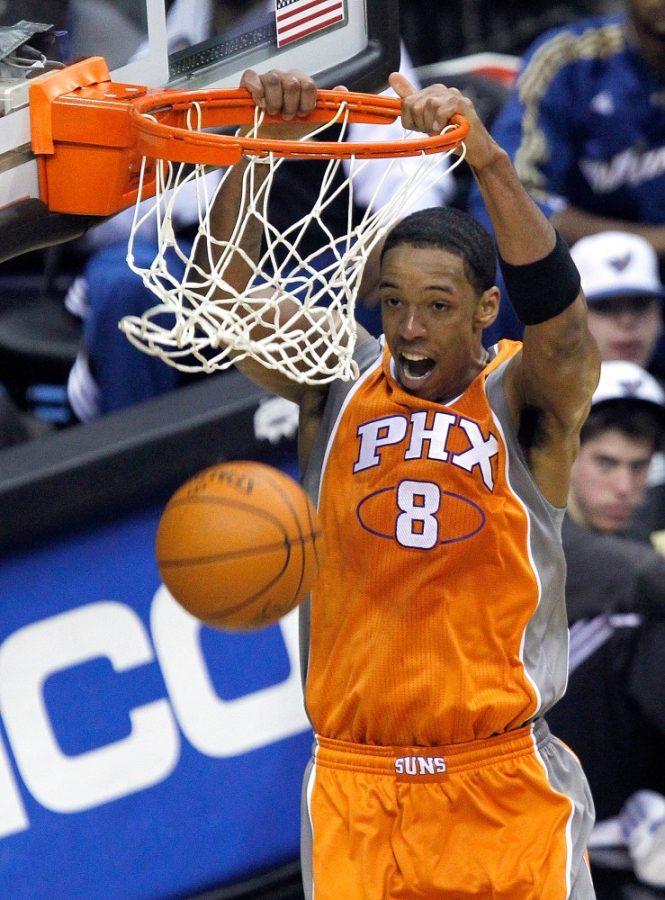 Phoenix Suns center Channing Frye (8) slam dunks during their game against the Washington Wizards played at the Verizon Center in Washington, D.C., Friday, January 21, 2011. Phoenix defeated Washington 109-91. (Harry E. Walker/MCT)